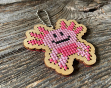 Load image into Gallery viewer, Axel axolotl laser cut wood cross stitch kit