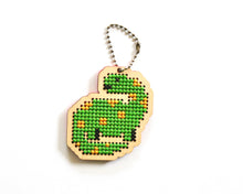 Load image into Gallery viewer, Dinosaur laser cut wood cross stitch kit