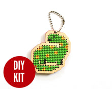 Load image into Gallery viewer, Dinosaur laser cut wood cross stitch kit