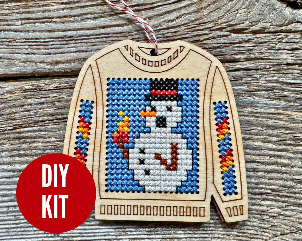 Burning snowman ugly sweater cross stitch kit
