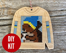 Load image into Gallery viewer, Tree ornament cross stitch on wood featuring squirrel drinking coffee on ugly Christmas sweater FREE SHIPPING
