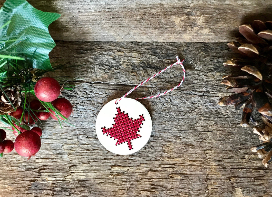 Cross stitch Canadian mini maple leaf laser cut wood Christmas tree ornament by Canadian Stitchery