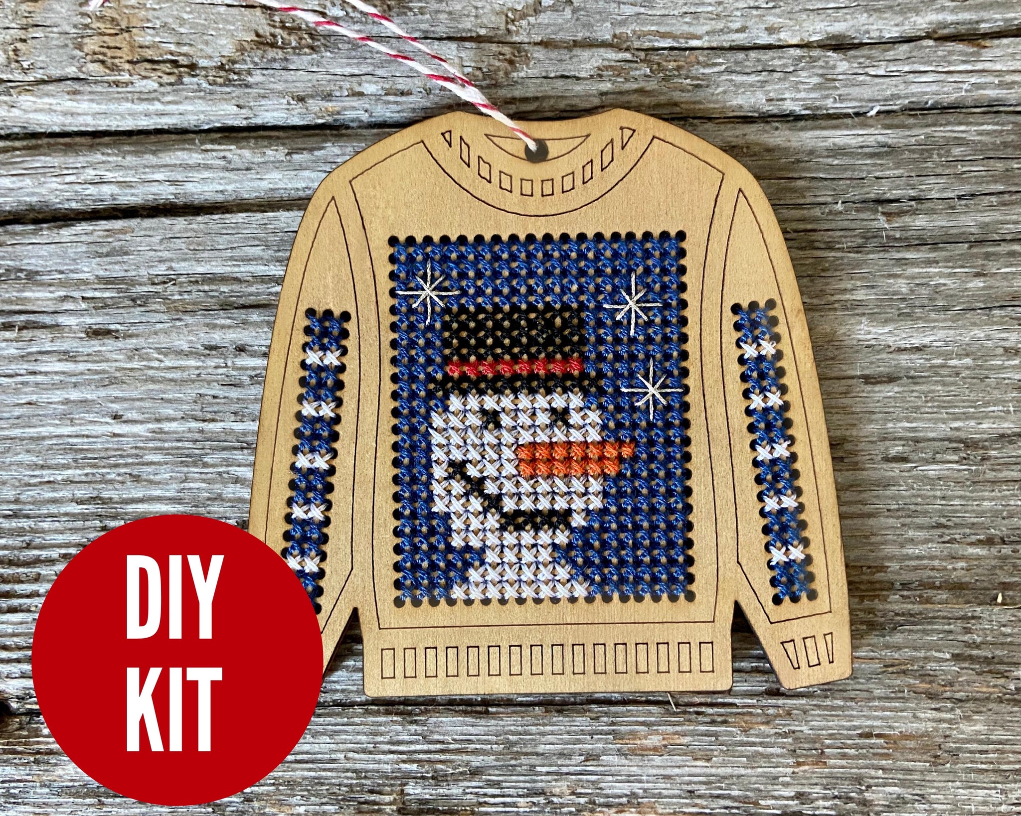 Ugly sweater with cheerful snowman ornament kit Canadian Stitchery